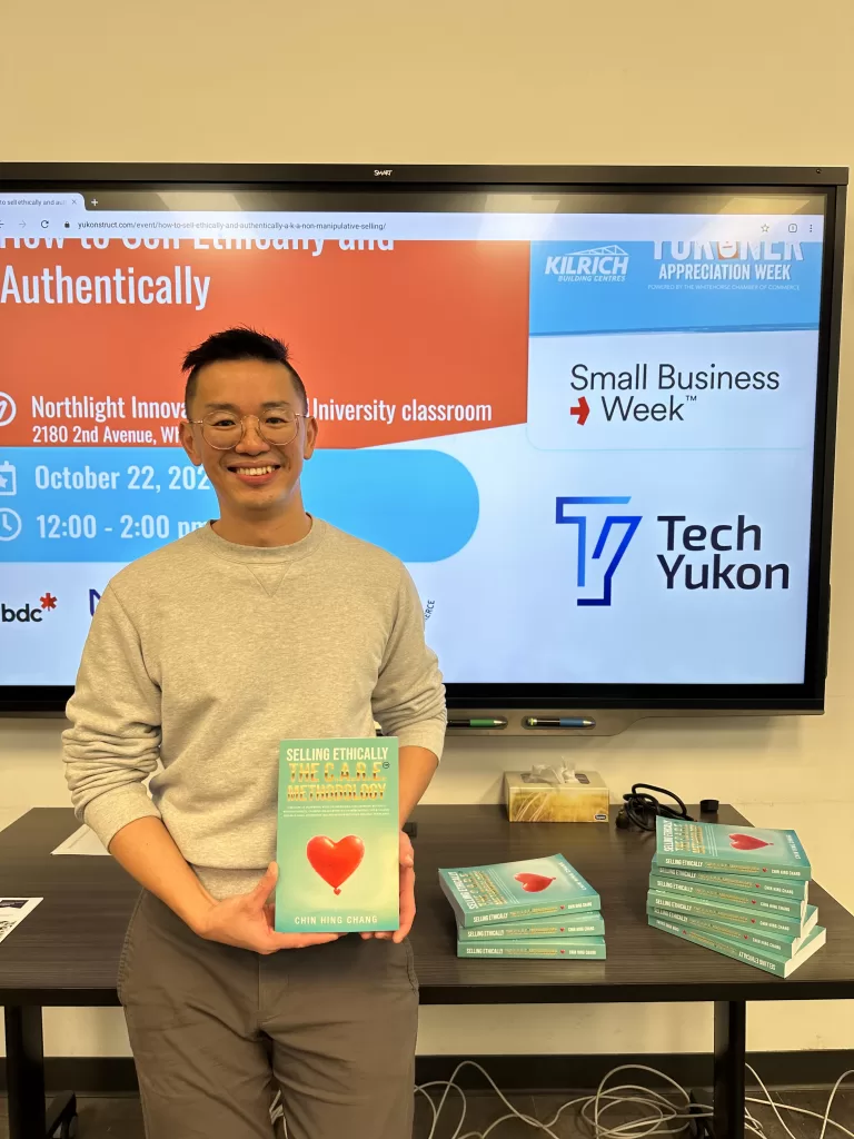 Chin Hing Chang with his book - Selling Ethically: The C.A.R.E. Methodology